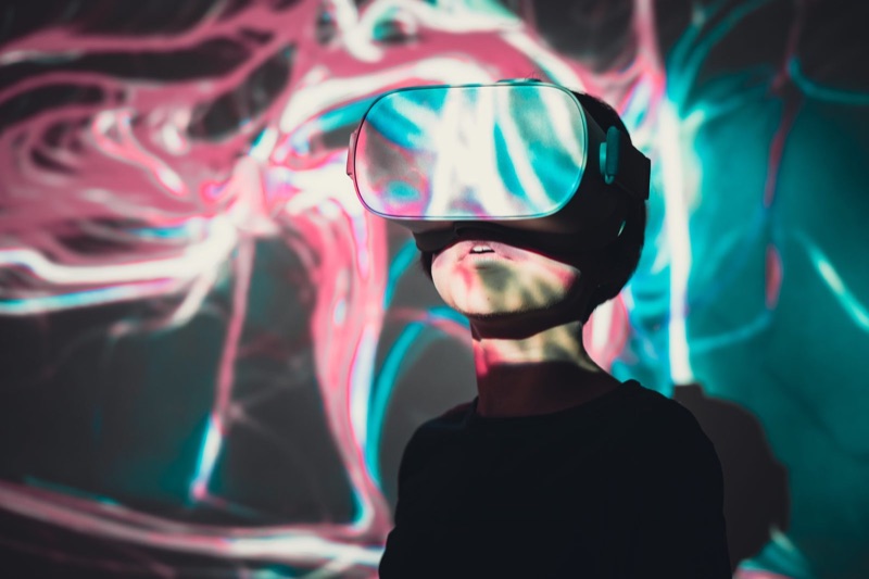 Person exploring virtual reality with a headset